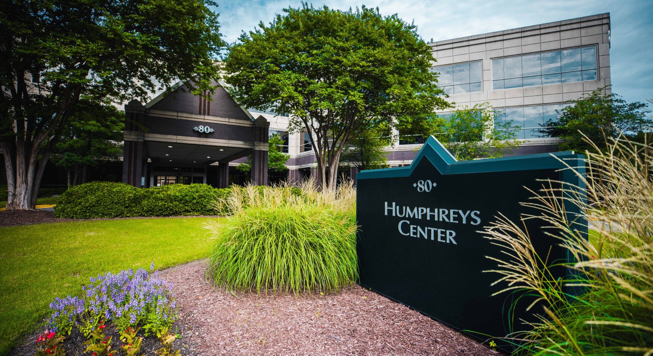 Humphreys Center entrance with green landscaping.