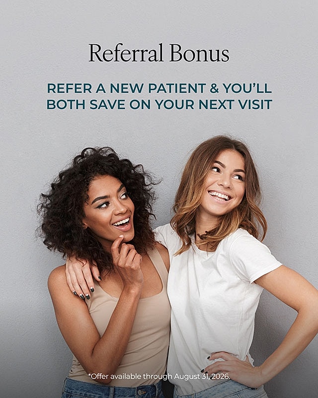 Referral bonus promotion with two smiling women.